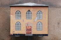Sweden, Stockholm, The Old Town decorated utility meter unit.