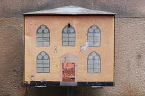 Sweden, Stockholm, The Old Town decorated utility meter unit.