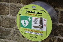 England, Yorkshire, Haworth, Defibrillator at a rural railway station.