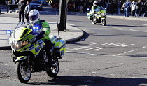 Englan, London, Trafalgar Square, Metropolitan police bike on blue lights.