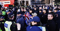 England, London, Parliament Square, Riot police and public order police contain a group of right wing supporters.