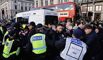England, London, Parliament Square, Riot police and public order police contain a group of right wing supporters.