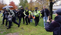 England, London, Jubilee Gardens near the London Eye and the BP building. Police arrest a Just Stop Oil protertor under the public order act. He had been identified using facial recognition technology...