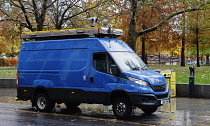 England, London, Jubilee Gardens near the London Eye and the BP building. Just Stop Oil Protestors monitored by an unmarked police van using facial recognition technology.