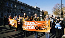 England, London, Whitehall, Just Stop Oil march and rally, protesters we arrested for stopping the traffic outside Downing Street, 23rd November 2023.