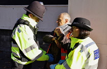 England, London, Whitehall, Just Stop Oil march and rally, protesters we arrested for stopping the traffic outside Downing Street, 23rd November 2023.