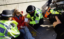 England, London, Whitehall, Just Stop Oil march and rally, protesters we arrested for stopping the traffic outside Downing Street, 23rd November 2023.