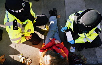 England, London, Whitehall, Just Stop Oil march and rally, protesters we arrested for stopping the traffic outside Downing Street, 23rd November 2023.