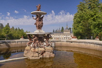 Spain, Castile, San Ildefonso, Palacio Real de la Granja de San Ildefenso dating from the 1720's, with the Fountain of the Three Graces in the foreground..