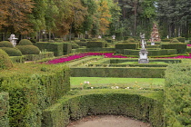 Spain, Castile, San Ildefonso, Palacio Real de la Granja de San Ildefenso, section of the palace gardens in the Jardin a la Francaise style, Parterre de La Fama and La Fama fountain showing fame ridin...