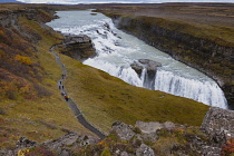 Iceland, Golden Circle, Thingvellir National Park in Autumn colours. The Mid-Atlantic Rift between the North American and Eurasian tectonic plates. Gullfloss Waterfall, the Golden Falls on the River H...