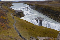 Iceland, Golden Circle, Thingvellir National Park in Autumn colours. The Mid-Atlantic Rift between the North American and Eurasian tectonic plates. Gullfloss Waterfall, the Golden Falls on the River H...