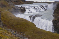 Iceland, Golden Circle, Thingvellir National Park in Autumn colours. The Mid-Atlantic Rift between the North American and Eurasian tectonic plates. Gullfloss Waterfall, the Golden Falls on the River H...