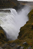 Iceland, Golden Circle, Thingvellir National Park in Autumn colours. The Mid-Atlantic Rift between the North American and Eurasian tectonic plates. Gullfloss Waterfall, the Golden Falls on the River H...