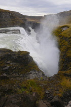 Iceland, Golden Circle, Thingvellir National Park in Autumn colours. The Mid-Atlantic Rift between the North American and Eurasian tectonic plates. Gullfloss Waterfall, the Golden Falls on the River H...