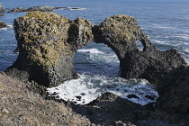 Iceland, Snaefellsnes Peninsula National Park, Gatklettur stone arch The Hellnar Arch on the coast between Hellnar and Arnarstapi.