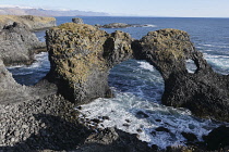 Iceland, Snaefellsnes Peninsula National Park, Gatklettur stone arch The Hellnar Arch on the coast between Hellnar and Arnarstapi.