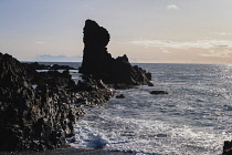 Iceland, Snaefellsnes Peninsula National Park, Djupalonssandur black sand beach. Rock formations.