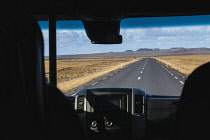 Iceland, Snaefellsnes Peninsula National Park, country road surfaced with fish oil seen from inside a camper van.