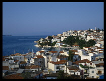 Greece, Sporades Islands, Skiathos, View over town rooftops and harbour.