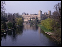 England, Warwickshire, Warwick,  View along River Avon towards medieval castle.