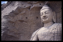 China, Shanxi Province, Datong,  Yunguan, Buddist Caves Statue of Buddha Head & shoulders shot.