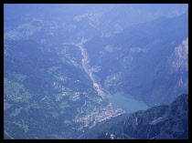 Austria, Karnten, Obervelach, Railway viaduct with Reisseck Gruppe Mountains beyond.