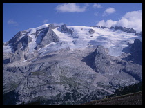 Italy, Dolomites Mountains, View over valley and Village of Wolkenstein in Grodner Tal.