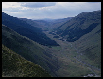 Switzerland, Landscape, View east from the summit of Battelmatthorn into Italy  with Lago di Morasco and Refuge Busto in the valley below.