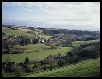 England, Cumbria, Lake District, Stone boat house beside Devoke Water and Birker Fell.