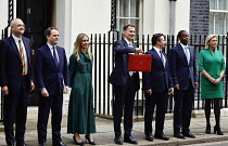 England, London, Westminster, Jeremy Hunt, Conservative Chancellor of the Exchequer, holding the red despatch box on Downing Street  during budget day 2024.