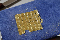 Architecture, Interior, Detail of gold leaf sheet used to decorate ceiling cornice moudling.