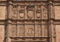 Spain, Castile and Leon, Salamanca, University of Salamanca, stone Plateresque facade of the Escuelas Mayores building with decorative reliefs and figures, main entry gate.