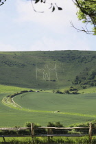England, East Sussex, Wilmington, The Longman figure carved into the chalk hillside of Windover Hill, 235 feet tall and depicted holding two staves.