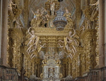 Spain, Galicia, Santiago de Compostela, the Cathedral of Santiago de Compostela,  Baldachin and highly decorated high altar with the famous Botafumeiro thurible out front.