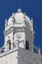 Portugal, Lisbon, Belem, Mosterio Dos Jeronimos or the Royal Monastery of Saint Mary of Belém, highly decorated tower of the monastery.