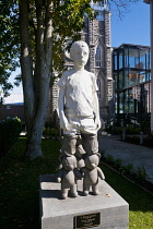 Canada, Quebec Province, Quebec City, Vieux Quebec, Old Quebec City Upper Town, Teddy Bears (2023) by German artist Willy Verginer depicting a young boy kneeling on teddy bears.