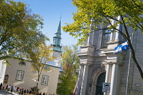 Canada, Quebec Province, Quebec City, Vieux Quebec, Old Quebec City Upper Town, St Andrews Presbyterian Church, schoolchildren and flag of Quebec.