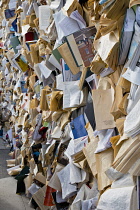 Canada, Quebec Province, Quebec City, Old Quebec or Vieux Quebec. The artwork CUL-DE-SAC-2024 by Spanish scultor Alicia Martin. A wall of books standing in front of canons on the Royal Battery in Bass...