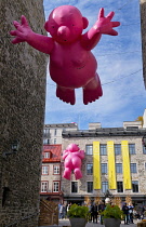 Canada, Quebec Province, Quebec City. Alley leading to Place Royale in Old Quebec City, Vieux Quebec in Basse-Ville or Lower Town. One of the inflatable Mr Pink, or Monsieur Rose S'Envole, sculptures...