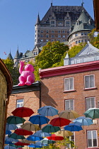 Canada, Quebec Province, Quebec City, Old Quebec City, Vieux Quebec. Chateau Frontenac with the iconic umbrellas on rue du Cul-de-Sac in the Quartier Petit Champlain in Basse-Ville, or Lower Town. One...