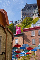 Canada, Quebec Province, Quebec City, Old Quebec City, Vieux Quebec. Chateau Frontenac with the iconic umbrellas on rue du Cul-de-Sac in the Quartier Petit Champlain in Basse-Ville, or Lower Town.