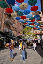 Canada, Quebec Province, Quebec City, Old Quebec City, Vieux Quebec. Chateau Frontenac with the iconic umbrellas on rue du Cul-de-Sac in the Quartier Petit Champlain in Basse-Ville, or Lower Town.