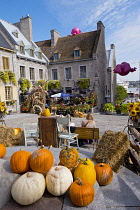 Canada, Quebec Province, Quebec City, Old Quebec City, Vieux Quebec. Place Royale in Basse-Ville, or Lower Town lined with shops and restaurants decorated with pumpkins and autumn foliage for Hallowee...