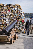 Canada, Quebec Province, Quebec City, Old Quebec City, Vieux Quebec. The artwork CUL-DE-SAC-2024 by Spanish scultor Alicia Martin. A wall of books standing in front of canons on the Royal Battery in B...