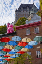 Canada, Quebec Province, Quebec City, Old Quebec City, Vieux Quebec. Chateau Frontenac with the iconic umbrellas on rue du Cul-de-Sac in the Quartier Petit Champlain in Basse-Ville, or Lower Town. One...