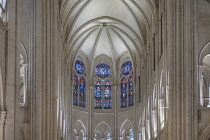France, Paris, Cathedral de Notre Dame, Stained glass in the East Rose window of the restored cathedral after the fire of 2019, the East Window above the high altar.