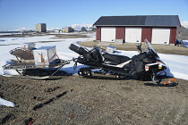 Norway, Svalbard, Ny-Alesund, Snow mobile and trailer with rifle carrier.