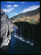 France, Languedoc Roussillon, Herault River, Gorge de L'Herault, Water draining into river from marshy ground above.