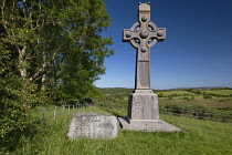 Republic of Ireland, County Donegal, Gartan, Stone cross at the site of Saint Colmcille's birthplace in 521 AD erected by Cornelia Adair in 1911.